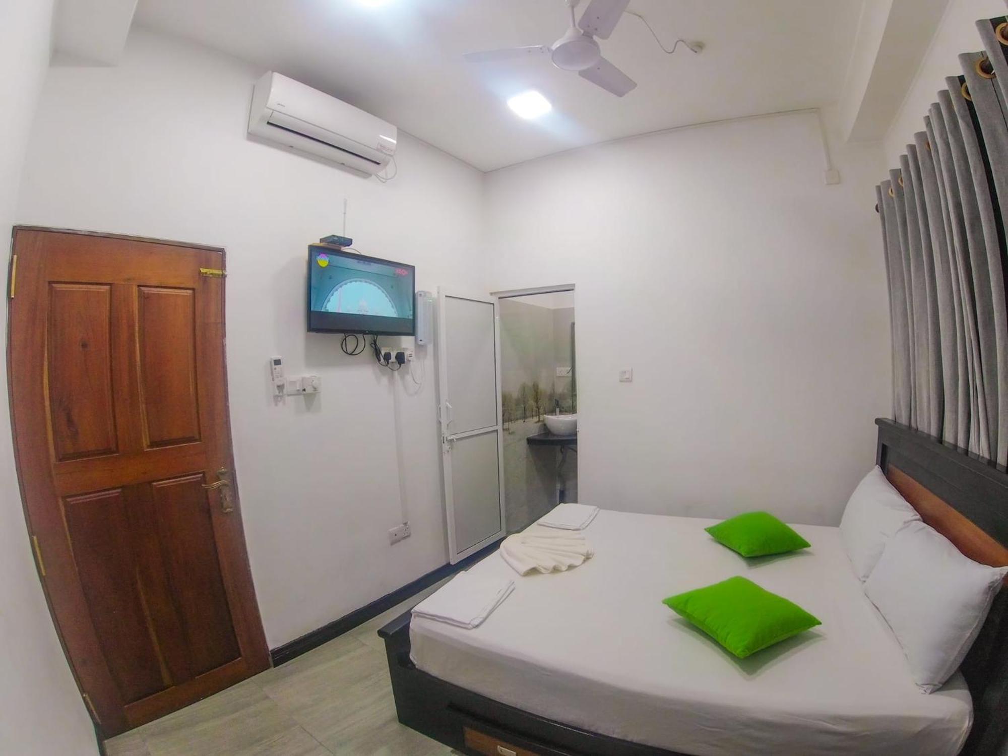Sea Breeze Guest House Negombo Habitación foto